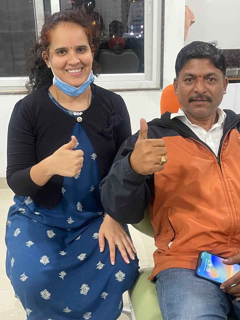 Male patient with Dr. Sumedha Chithaluru after dental treatment at Sharanya Dental Clinic, Kondapur, Hyderabad