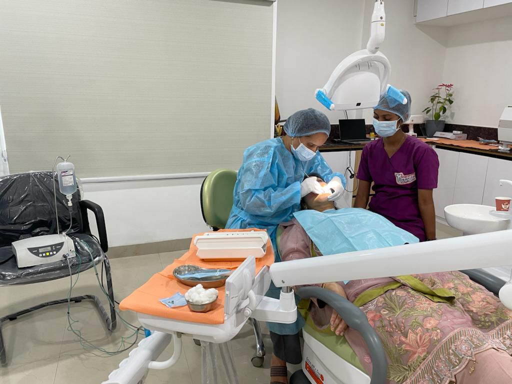 Dr. Sumedha performing advanced dental treatment in a sterilized operatory at Sharanya Dental Clinic, Kondapur